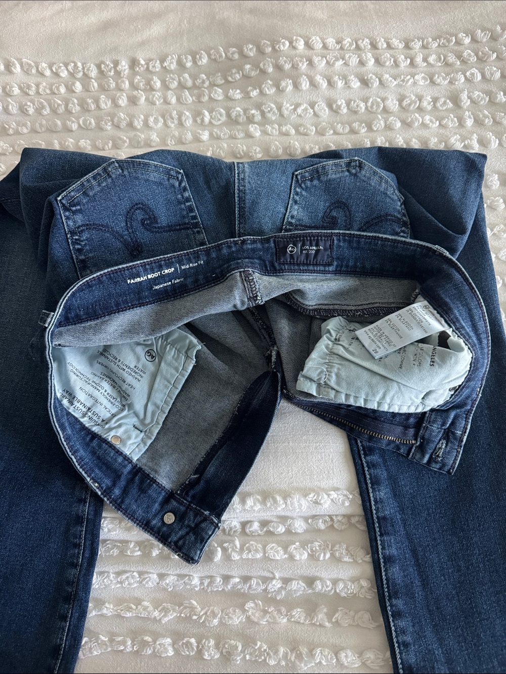 Ag Adriano Goldschmied Indigo Bootcut Jeans with Subtle Pocket Stitch